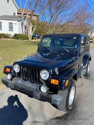 Image result for Brilliant Black 2002 Jeep