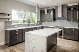 It is characterized by flecks of black and dark gray minerals that stretch across a cool off white to grayish background. Auburn Custom Kitchens Gallery