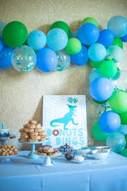 Birthday Ideas In Dallas Tx Donuts And Dinos 1st Birthday Party Donut Birthday Parties Boy Birthday Parties Dinosaur Birthday Party