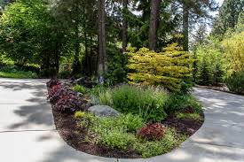 Cottage Garden Driveway Island Landscaping Circle Driveway Landscaping Landscaping With Rocks Yard Landscaping