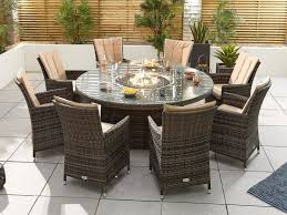 Our lp gas fire pits, with their crafted tabletops and hidden tank chambers, allow you to enjoy your outdoor living space during any season. Nova Outdoor Living Sienna 8 Seat Dining Set With Fire Pit 1 8m Round Table At Gardenman