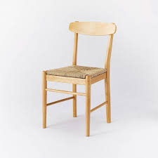 They exhibited their new collection at Logan Wood Dining Chair With Woven Seat Natural Threshold Designed With Studio Mcgee Target