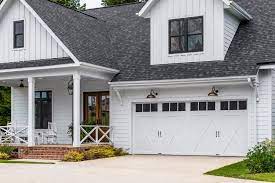 Can white farmhouse barn doors be returned? White Board And Batten Farmhouse Farmhouse Garage Cincinnati By Clopay Houzz