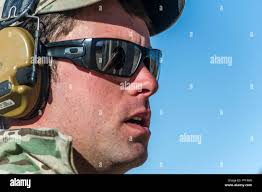 A U.S. Special Forces Green Beret Soldier, assigned to 7th Special Forces  Group (Airborne), Operational Detachment-A, records and reports fired  rounds