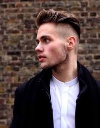 A shaved head is like a blank canvas that gives you the possibility to play and experiment with different beard styles. Picture Of Cool Shaved Side Hairstyles For Men 9