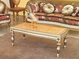 Warm and woodsy repurposed fence table. Classic Coffee Table In Carved Wood For Luxury Hotel Idfdesign