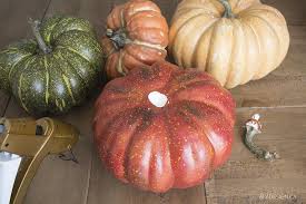 The stacked pumpkins are a halloween decoration in build mode. How To Make A Stacked Pumpkin Topiary The Easy Way