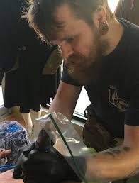 Army veteran fulfills lifelong dream by opening tattoo shop in Grafton