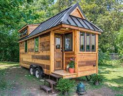 The high stud interior gives the feeling of generous spaciousness while the chandeliers and pendant lighting throughout add ambiance to your tiny house. Tiny House Big Investment Landlords Co Nz