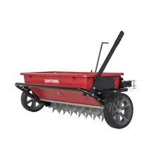 Note that for the aerator spikes or spreader to work, the side lever must be inserted into the notch which angle the unit downward and forces the spikes toward the ground. Craftsman Capacity Spike Aerator Drop Tow Behind Spreader In The Tow Behind Spreaders Department At Lowes Com