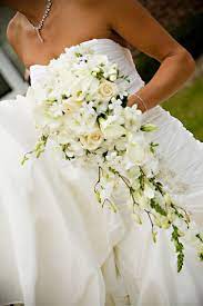 Silk day lily wedding bouquets cascading. Cascading Orchid Bouquet With Stephanotis Cascading Style Bouquet With Calla Lilies Dendr Cascading Wedding Bouquets Flower Bouquet Wedding Wedding Bouquets