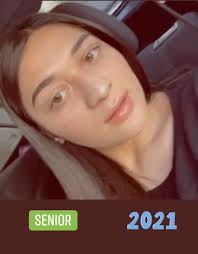 Nikki Rowe introduces new football coach Jamaar Taylor to community