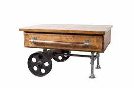 Buying a new coffee table can be a tiring process. Wooden Coffee Table With Cast Iron Wheels