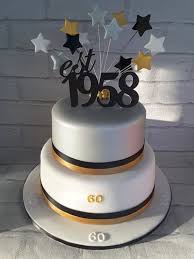 They have about 30 or 40 options, which include this one made just for birthdays that contains cake, truffles, tea, jams, chocolates, and more. 60th Birthday Cake Gold Silver And Black With Stars Birthday Cakes For Men 60th Birthday Cake For Men 70th Birthday Cake