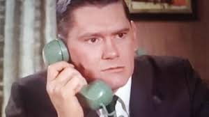 Who hired Sasha to kill Manny in season 1 episode 7 of The Family Business?