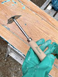 The kitchen currently has white cabinetry that i was planning on updating with fresh paint. How To Easily Strip Wood Cabinets Best Paint And Varnish Remover Dans Le Lakehouse