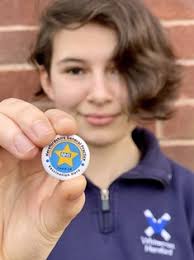 Local student designs 'Vaccination Hero Thank You' badge