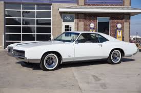 Image result for Riviera Champagne 1966 Buick