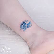 40 Colored Delicate Tattoos By Tattooist Nanci Tattooadore Delicate Tattoo Waves Tattoo Inspirational Tattoos