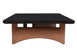 Characterized by its clean lines and open design, this understated coffee table brings a contemporary touch to your living room layout. Henry Coffee Table