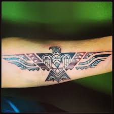 A conversation with mike crowe from the museum of the cherokee indian before the development of the cherokee written language, tattoos were used to identify one another in historic societies, and were especially prevalent among warriors, who had to earn their marks. Eagle Tattoo Native American Novocom Top