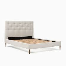 The panel footboard has a crowned top edge and a framed panel in the middle for a tailored touch. Emmett Bed Wood Legs