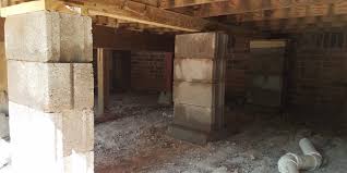 Often, the guys would run a long metal beam with a level on top (not pictured) to check that the measuring off that line enabled them to make sure each course of the foundation was level with the. Block And Beam Hydroguard Foundations Foundation Repair In Northeast Arkansas