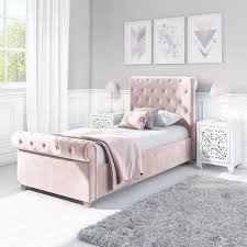 Spend this time at home to refresh your home decor style! Safina Roll Top Single Sleigh Bed In Baby Pink Velvet Furniture123
