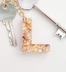 Pink And Cream Rose Petals With Gold Leaf Initial Keyring Etsy In 2021 Car Accessory Gifts Cream Roses Keychain