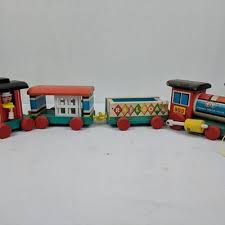 The site owner hides the web page description. Vintage 1960s Fisher Price Huffy Puffy Train 999 Estatesales Org