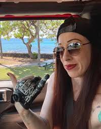 Bionic Angie': Crystal Falls amputee uses prosthetic fingers to continue  active lifestyle