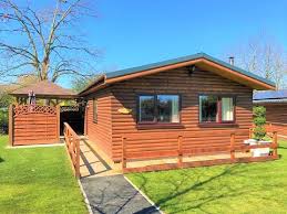 We've luxury lodges and log cabins with hot tubs dotted throughout the uk from yorkshire and the lake. Log Cabins With Hot Tubs In North Wales Llannerch Holiday Park Log Cabins