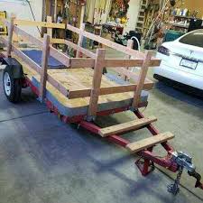 This is the inexpensive folding 4'x8' haulmaster 1200 lb flatbed trailer (deck not included) that goes for about $300 at harbor freight. Harbor Freight 4 X8 Folding Utility Trailer With Sides And Vans Suvs And Trucks Cars