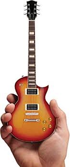All the latest models and great deals on cheap lavazza coffee machines are on currys. Axe Heaven Classic Cherry Sunburst Electric Mini Guitar Replica Cg 330 Buy Online In Angola At Angola Desertcart Com Productid 42222546
