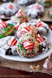 Christmas scrapbook paper {scraps are perfect!}, 7/8″ circle punch, hershey's kisses, and aleene's tacky sticker sheets. Candy Cane Kiss Cookies Sally S Baking Addiction