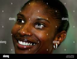 Denise holding hi-res stock photography and images