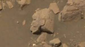 Was An Ancient Egyptian Warrior Woman Statue Spotted On Mars Al Arabiya English The money seems to depict an alien's head and a spaceship hovering over the earth. was an ancient egyptian warrior woman