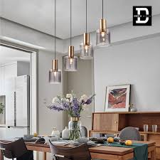 Install a dimmer to your ceiling and wall lighting (if you have it) so that you can set the your over the table lighting fixture needs to work both with your dining room and with your dining room table. Design Dining Room Table Pendant Lamp Glass Balls Hanging Light Ceiling Lighting
