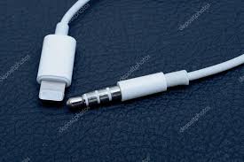 Lighting Connection And 3 5 Mm Audio Jack On Blue Background Stock Editorial Photo C Ifeelstock 124360204