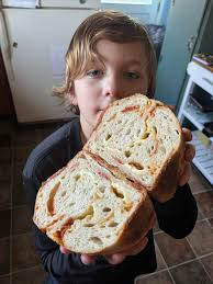 A 3-year-old's first pizza making attempt