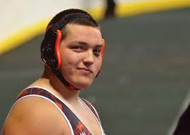 Make it a triple! Taos wrestlers bring home three state championship medals 