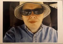 Blaze orange hat with three nail cross source?