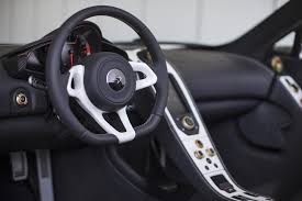 I got both the bezel and center console for only $1,400 on ebay and its all genuine mclaren! Mclaren Exclusive 650s Spider Al Sahara Dubai Motor Show