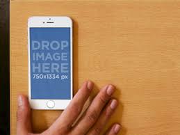 Combining urban, glam, industrial, and boho elements, the henry coffee table has a painted steel frame, with dual levels, and looks good in any space. White Iphone 6 Lying On Coffee Table Mockup Template By Placeit On Dribbble