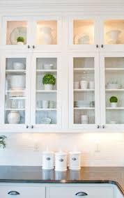 The look comes together with gold hardware fixtures. 16 Kitchen Glass Doors Ideas Kitchen Design Kitchen Remodel Kitchen Inspirations