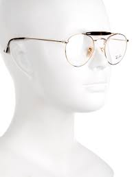 Black And Gold Ray Bans Eyeglasses Gold Tone Metal Ray Ban Eyeglasses With Round Frames Tortoiseshell Resin At Frame And Temple Tops And Adjusta Eyeglasses Ray Ban Eyeglasses Cat Eye Sunglasses