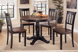 Owings By Ashley Dining Room Collection Round Dining Table Sets Round Dining Room Table Round Dining Room Sets
