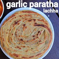 Lachha Garlic Paratha Recipe Garlic Lachha Paratha Parantha Bread Indianflatbread Layered Baked Indian Snacks Indian Food Recipes Vegetarian Recipes