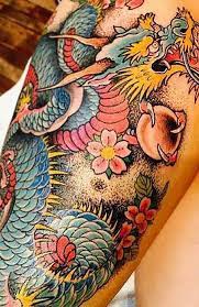 20 Fierce Dragon Tattoo Designs For Women Dragon Tattoo Colour Japanese Dragon Tattoo Dragon Tattoo For Women