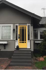 A coat of cream paint on the walls ties the look together. 31 Houses With Yellow Front Entry Door Ideas Sebring Design Build